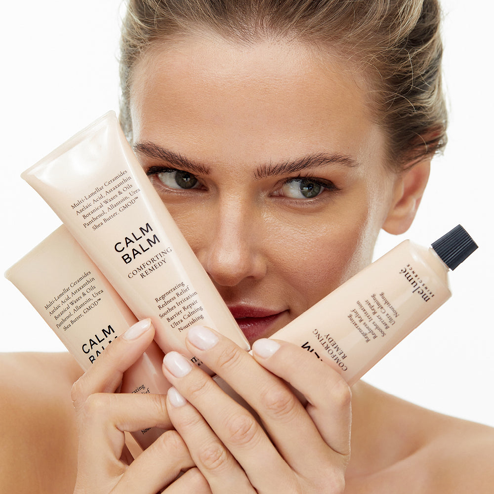 image mood of model holding three calm balms in her hands