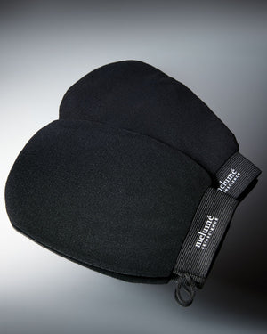 Black body gloves with a rayon photographed on a dark gray to black gradient background.