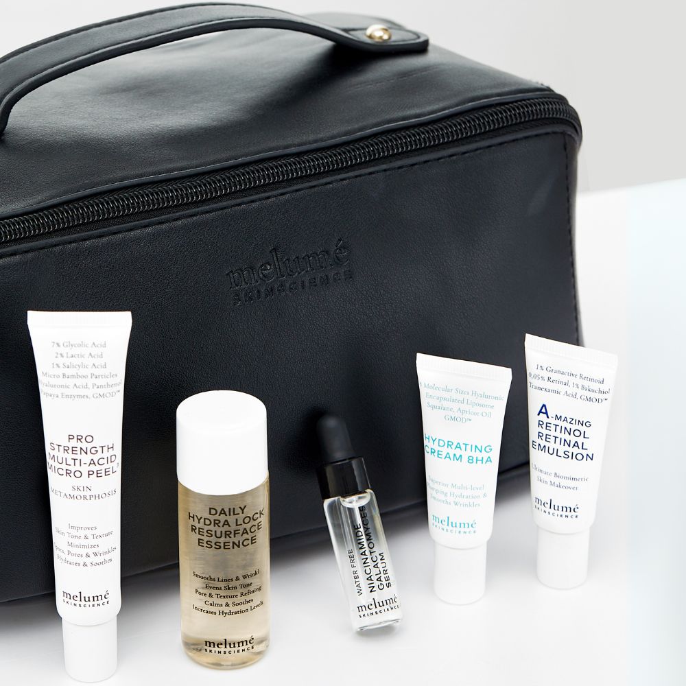 melume skinscience image packshot of five mini versions of amazing retinol retinal emulsion, daily hydra lock resurface essence, pro strength multi-acid micro peel, hydrating cream 8HA and water free niacinamide galactomyces serum and vegan black beauty bag