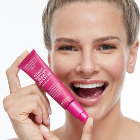 image mood of model posing with power peptide micro emulsion and smiling